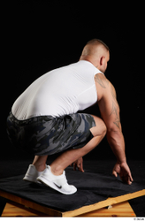 Whole Body Man White Sports Shorts Muscular Kneeling Top Studio photo references